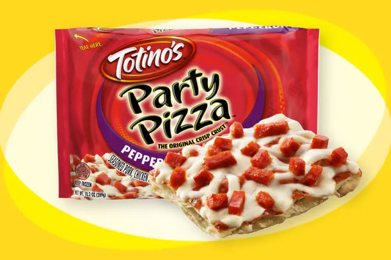Totino's Pepperoni Party Pizza pack with a slice of the pizza in front on a yellow background